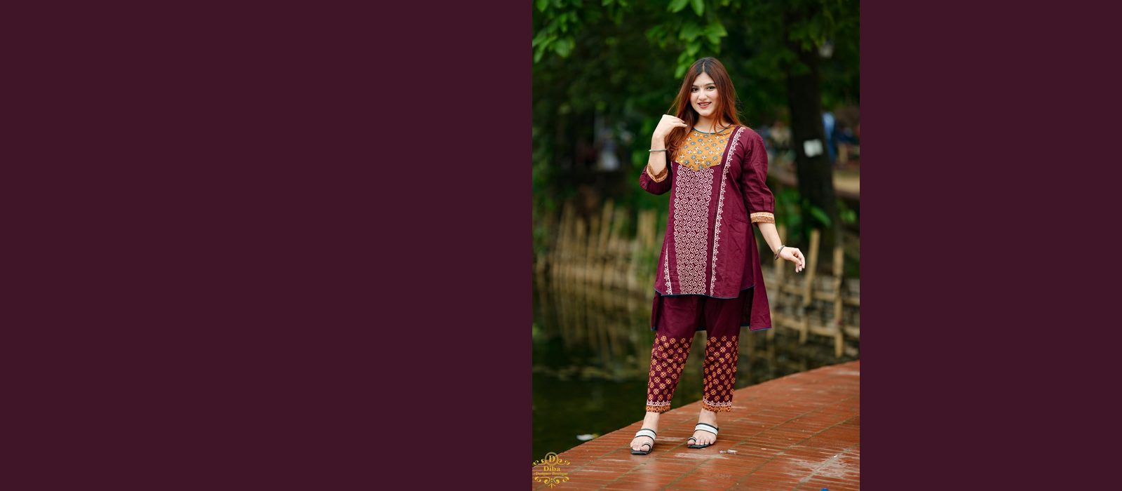 Model wearing a plum co-ord set outdoors