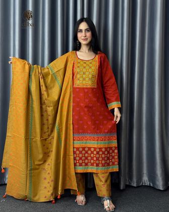 Rust Mirrorwork Three Piece worn by a model, full length