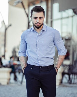 Sky Blue Oxford Shirt worn by a model, full length