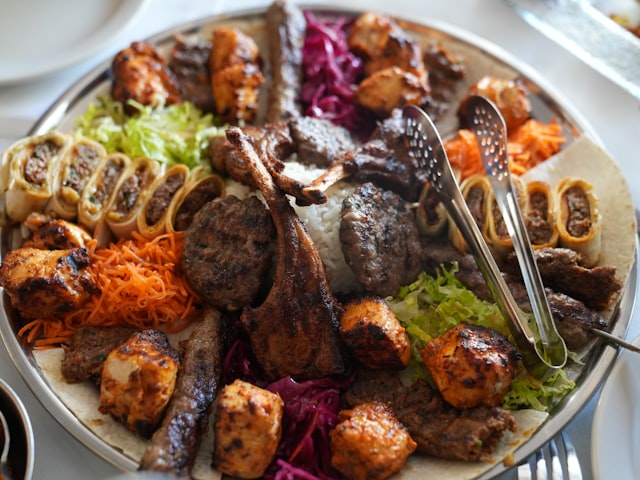 Large platter of assorted grilled meats and vegetables