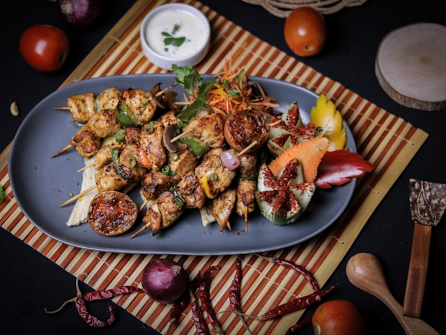 Blue plate with braised meat and vegetables