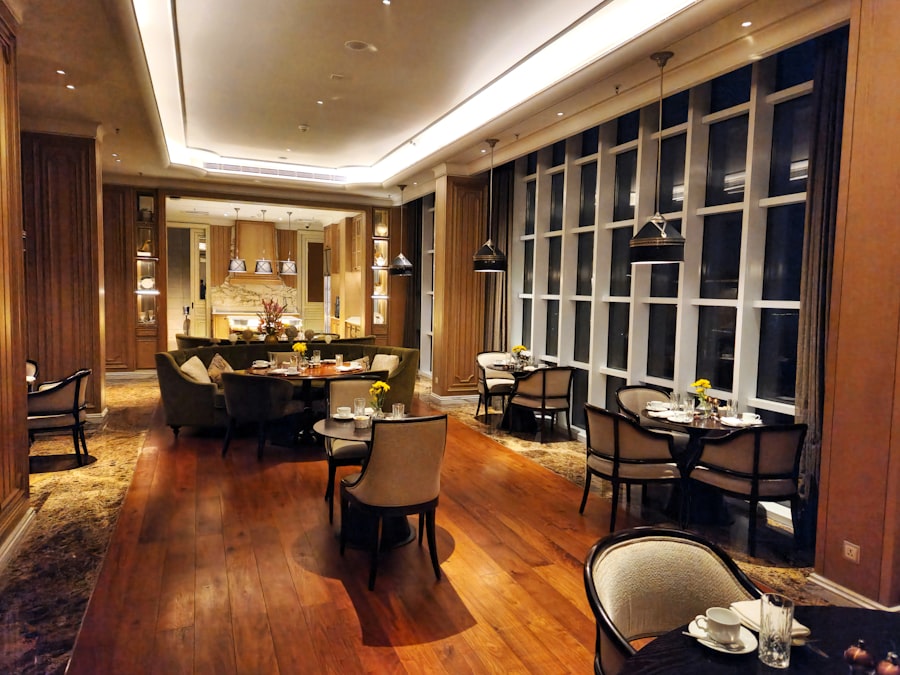 Main dining room with laid tables and warm lighting